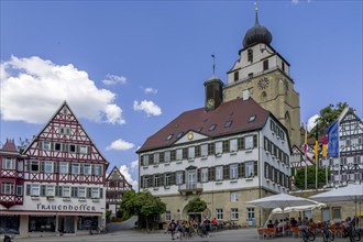 Half-timbered houses on the Historic Market Square and in the background Protestant Church collegiate church