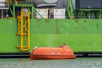 Orange Palfinger totally enclosed lifeboat for marine and offshore applications of the installation vessel