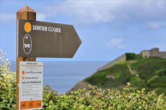 Signpost for footpath along the coast at Finistere