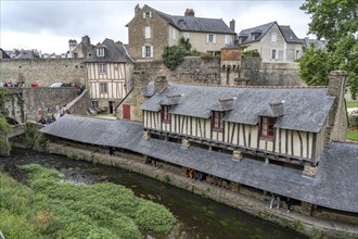 Old washhouse on the river La Marle in front of the city wall in Vannes