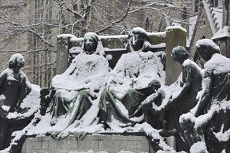 Monument in honour of the Van Eyck brothers in winter in the snow