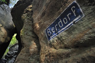 Berdorf sign on sandstone rock at Wanterbaach in Berdorf