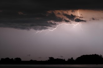 Thunderstorm lightning over the Weser