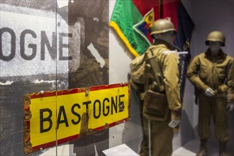Bullet-riddled Bastogne town sign in the Bastogne War Museum devoted to the Second World War Two Battle of the Bulge in the Belgian Ardennes