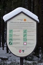 Information sign in the Harz National Park in winter