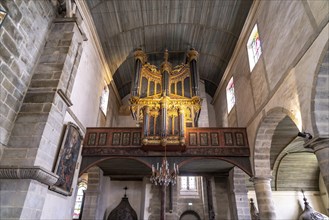 Church organ in the interior of the church of Notre-Dame de Saint-Thegonnec in the Enclosed Parish of Saint-Thegonnec