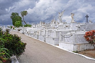 Santa Ifigenia Cemetery with white marble tombs and graves of famous Cubans in Santiago de Cuba on the island Cuba
