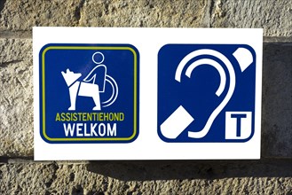 Pictograms welcoming wheelchair users with assistance dogs and hearing impaired persons to access public building
