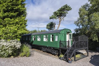 Old railway carriage converted into a stationary hostel