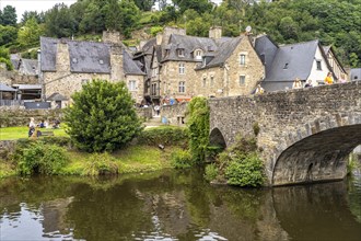 Medieval buildings and stone bridge on the river Rance in Dinan