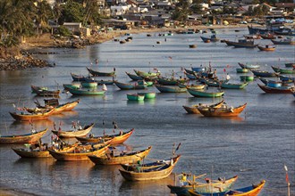 Many colourful fishing boats in the sea