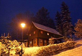 Winter night with half-timbered house