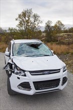 Wrecked car after collision with moose