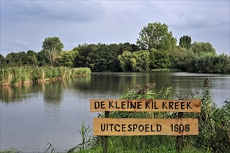Wooden signpost for the Kleine Kilkreek near Assenede