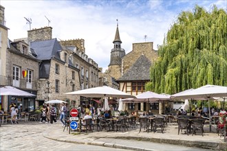 Restaurant and the Tour de l'Horloge clock tower in the historic old town of Dinan