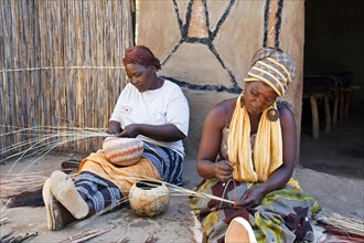 Women doing needlework