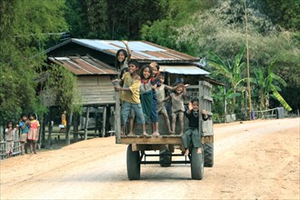 Children on tractor trailer