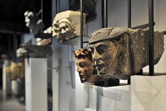 Medieval stone corbel heads on display at STAM
