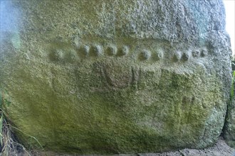 Reliefs of female breasts in the dolmen of Kerguntuil near Tregastel