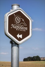 Signpost of the Route Napoleon commemorating the 1815 Battle of waterloo in Belgium