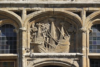 Emblem of ship above door of guildhall at the Grass Lane