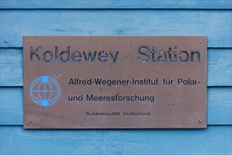 Sign with logo of the Koldewey Station for Arctic and marine research at Ny-Alesund on Svalbard