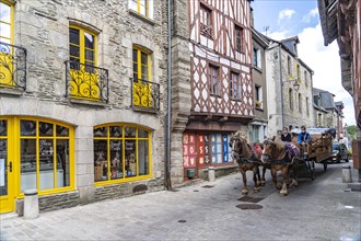 Horse-drawn carriage in the old town of Josselin