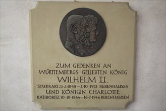 Commemorative plaque on castle wall