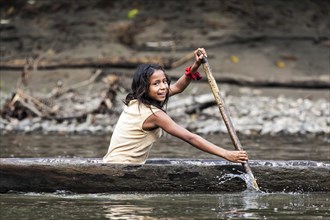 Indian girl in a canoe