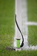 Electrical line in post of a corner flag