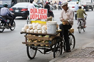 Coconut seller at the roadside
