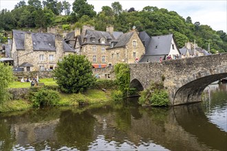 Medieval buildings and stone bridge on the river Rance in Dinan
