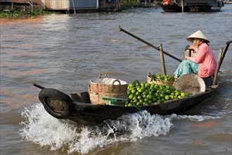 Fruit seller in boat