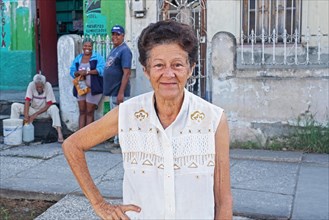 Elderly Cuban lady posing on the street in Bayamo