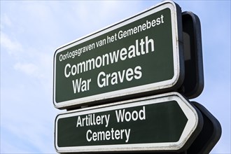 Signpost for military cemetery of the Commonwealth War Graves Commission burial ground for First World War One British soldiers in West Flanders