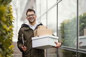 Delivery male with packages