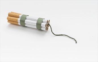 Top view cigarette bundle wick against white background