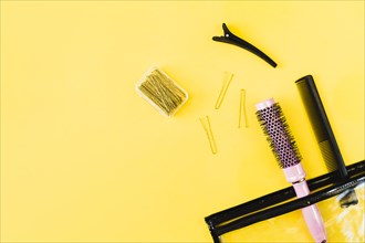 Combs hairpins near cosmetics bag