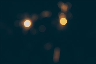 Blurred bokeh lights black background