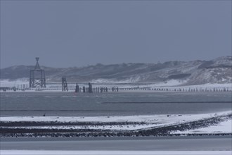 View from the island of Minsener Oog to Wangerooge in winter