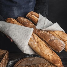 Crusty loaves bread wrapped burlap fabric