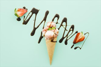 Ice cream waffle cone with chocolate syrup