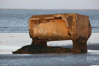 Remains of a World War II bunker on the island of Minsener Oog