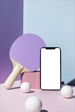 Front view ping pong balls paddle with smartphone
