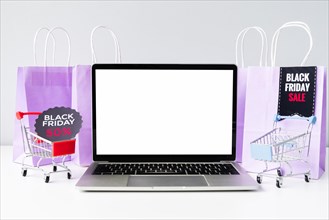 Front view laptop with shopping carts mock up