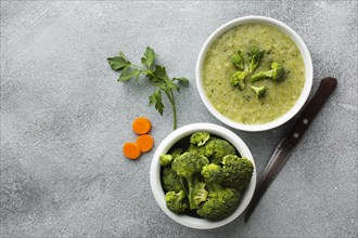 Top view broccoli carrots bisque with copy space