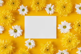 Top view beautiful spring flowers composition with empty card