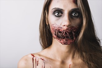 Young lady with creepy makeup