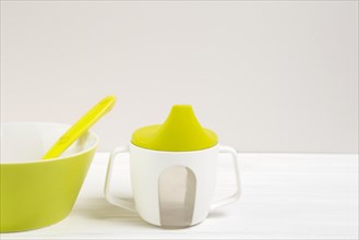 High angle bowl baby bottle with copy space