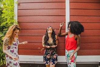 Girls celebrating with confetti